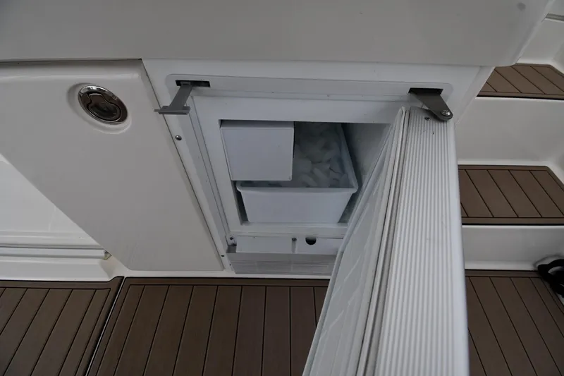 Lady Louise Yacht Photos Pics Ice maker on 2000 Silverton 392 Motor Yacht with open door and visible ice.