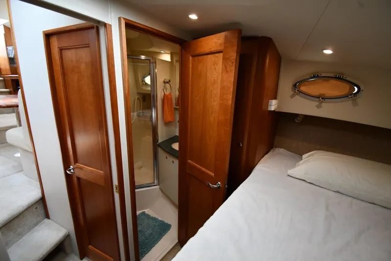 Lady Louise Yacht Photos Pics Interior of 2000 Silverton 392 Motor Yacht with bedroom and bathroom.