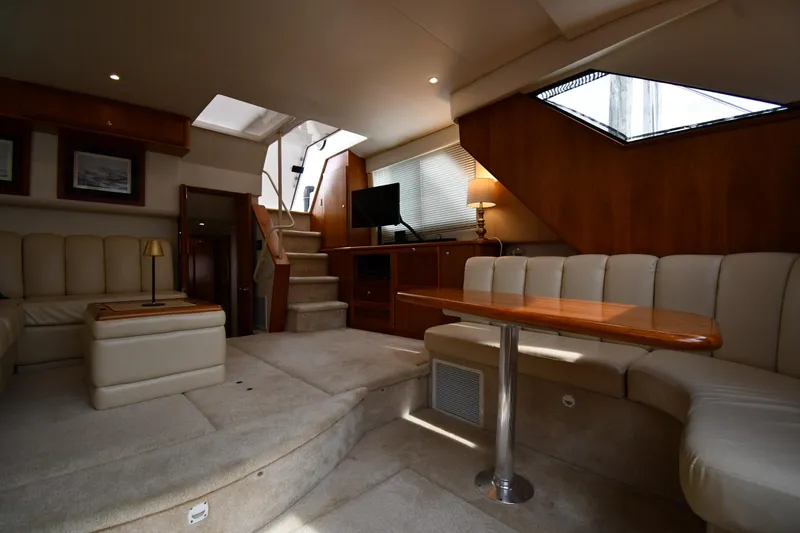 Lady Louise Yacht Photos Pics Luxurious interior of 2000 Silverton 392 Motor Yacht with plush seating and elegant decor.