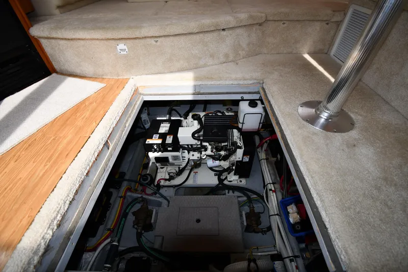 Lady Louise Yacht Photos Pics Engine compartment of a 2000 Silverton 392 Motor Yacht, showcasing mechanical components and wiring.