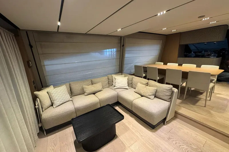  Yacht Photos Pics Luxurious interior of 2021 Ferretti Yachts 720 with modern seating and dining area.