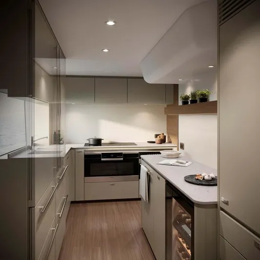  Yacht Photos Pics Modern kitchen interior on 2025 Princess Y95 Motor Yacht, featuring sleek cabinetry and appliances.