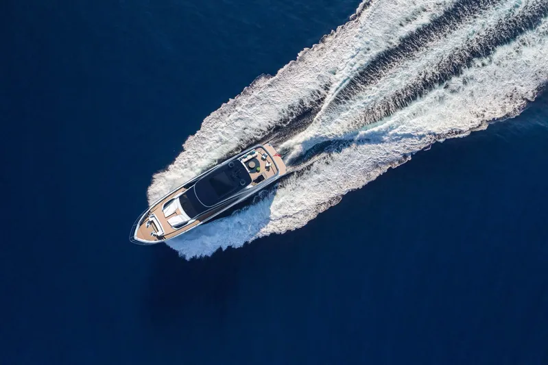  Yacht Photos Pics Aerial view of 2025 Princess Y95 Motor Yacht cruising on open water.
