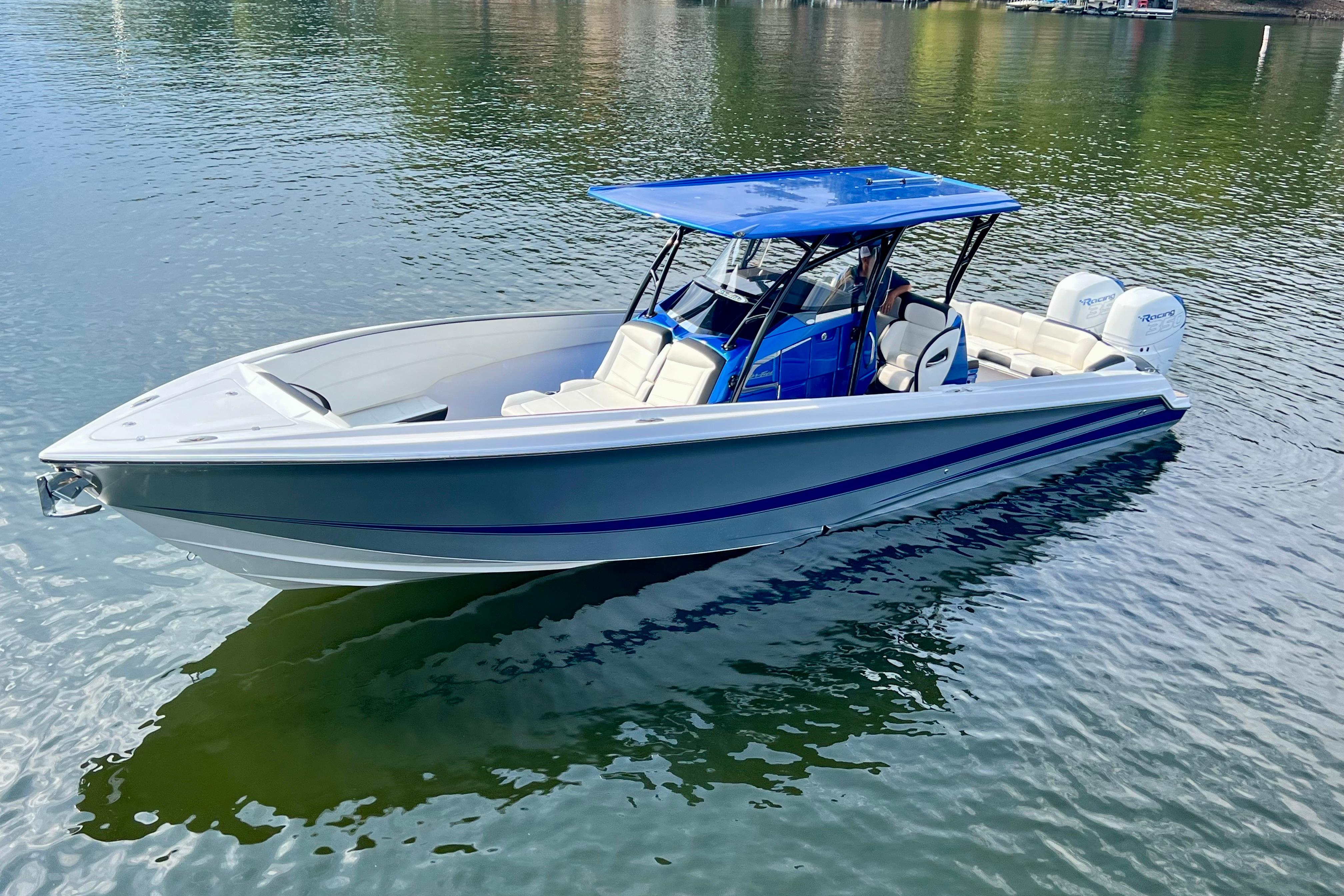 2020 Nor-Tech 340 Sport Center Console boat on calm water.