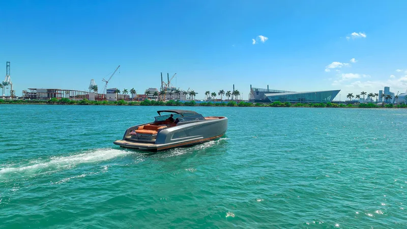 Spectra Yacht Photos Pics 2021 Vanquish Yachts VQ 45 cruising on a sunny day in a vibrant harbor.