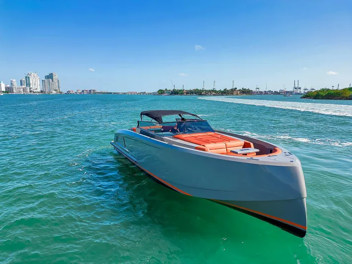 Spectra Yacht Photos Pics 2021 Vanquish Yachts VQ 45 cruising on clear blue waters.
