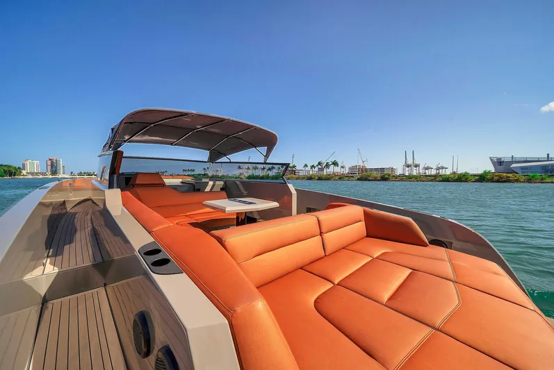 Spectra Yacht Photos Pics 2021 Vanquish Yachts VQ 45 with luxurious seating on a sunny day.