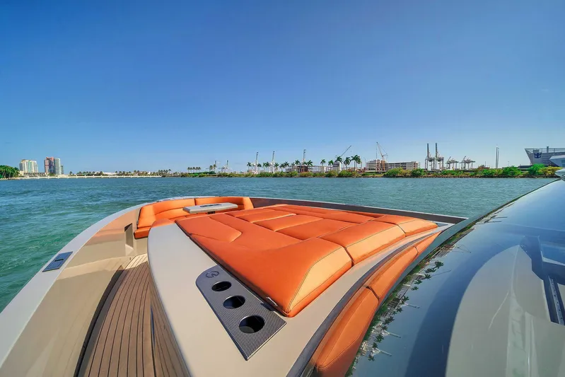 Spectra Yacht Photos Pics Vanquish Yachts VQ 45, 2021 model, luxury yacht on water with orange seating.