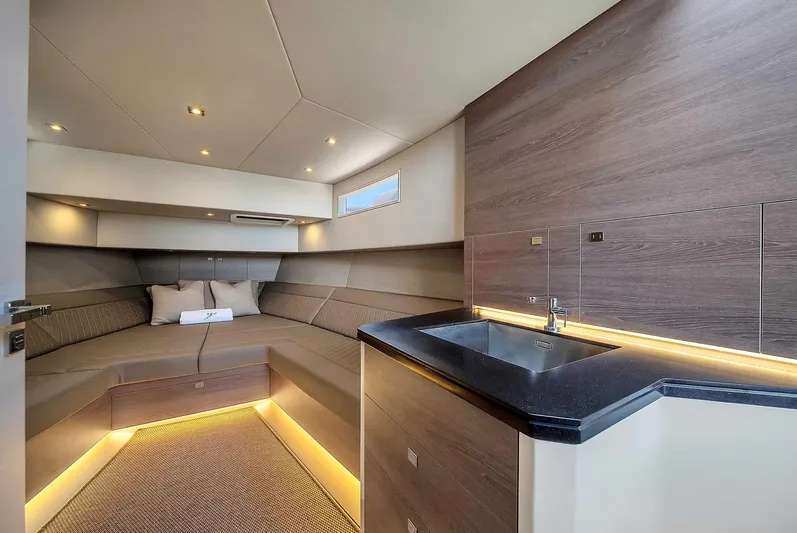 Spectra Yacht Photos Pics Luxurious interior of 2021 Vanquish Yachts VQ 45 with modern design and ambient lighting.