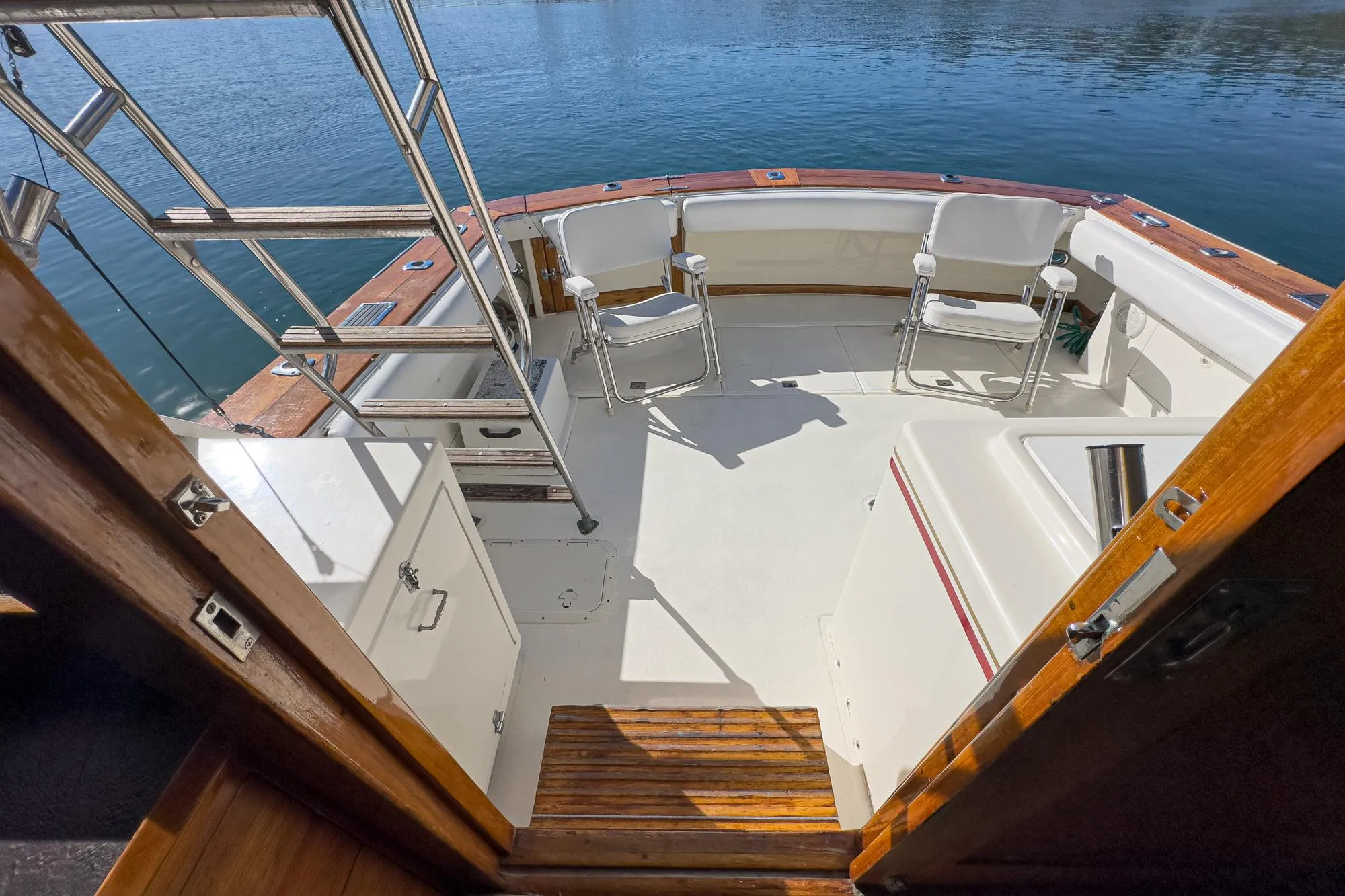 1974 Pacemaker Sportfisher boat with open aft deck.