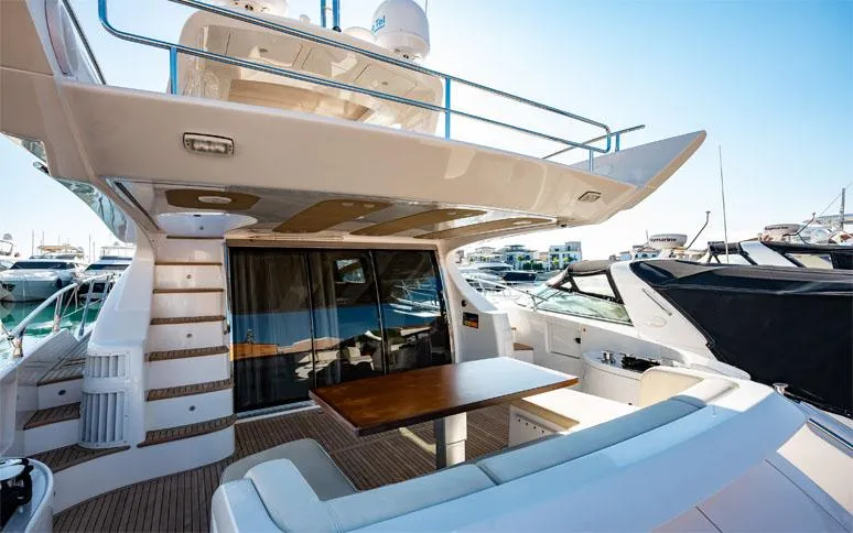  Yacht Photos Pics Luxurious 2014 Azimut 64 yacht with spacious deck and elegant seating area.