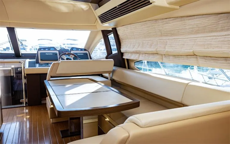  Yacht Photos Pics Luxurious interior of a 2014 Azimut 64 yacht with elegant seating and dining area.