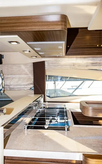  Yacht Photos Pics Interior of a 2014 Azimut 64 yacht featuring a modern kitchen design.