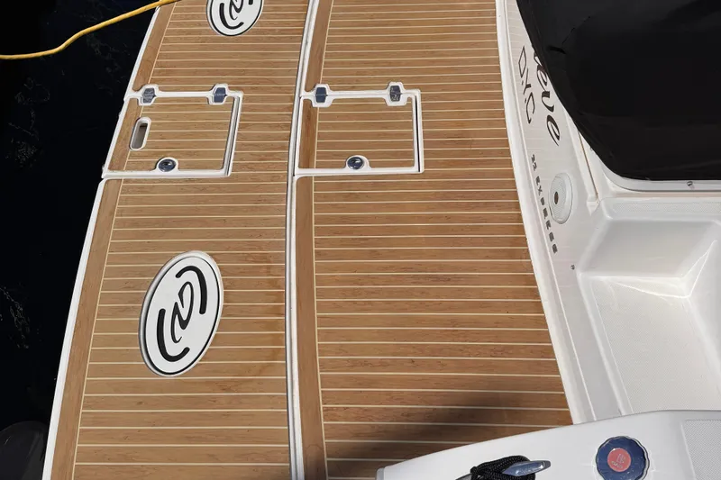  Yacht Photos Pics Teak deck of 2015 Regal 32 Express boat with custom logo design.