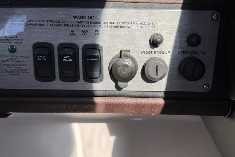  Yacht Photos Pics Control panel of a 2015 Regal 32 Express boat with engine and bilge switches.