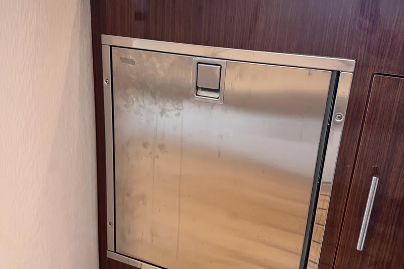  Yacht Photos Pics Stainless steel appliance door on 2015 Regal 32 Express yacht interior.