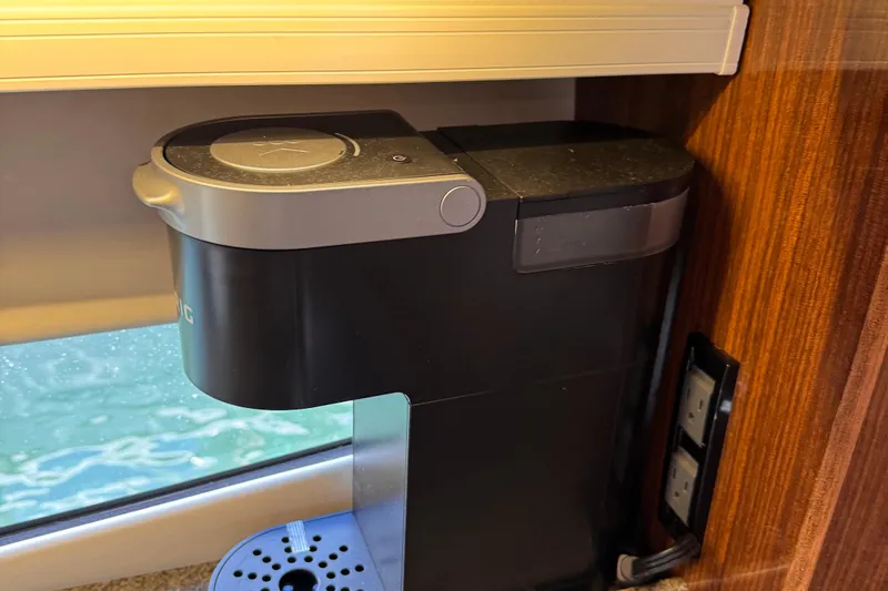  Yacht Photos Pics Coffee maker in 2015 Regal 32 Express boat kitchen, near window and power outlet.