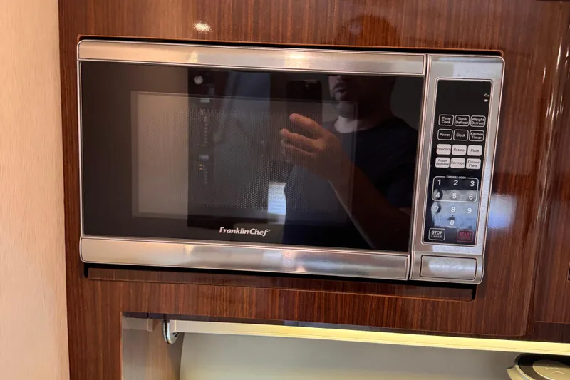  Yacht Photos Pics Franklin Chef microwave in 2015 Regal 32 Express boat interior.