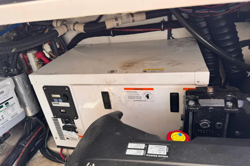  Yacht Photos Pics Engine compartment of a 2015 Regal 32 Express boat, featuring a Kohler generator.