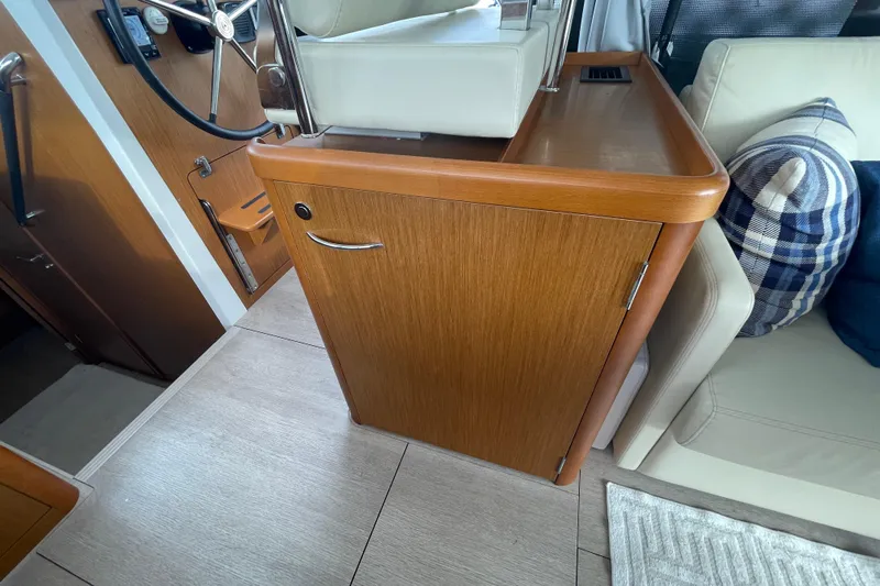 A To Z Yacht Photos Pics Interior of 2018 Beneteau Swift Trawler 35, featuring helm station and seating area.