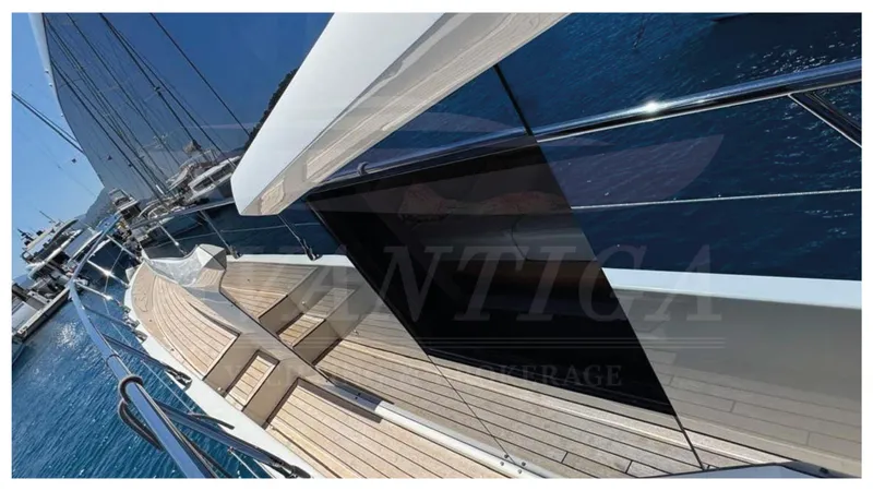  Yacht Photos Pics Luxurious Absolute 64 FLY yacht deck, 2016 model, with sleek design and ocean view.