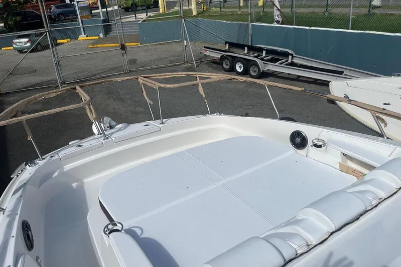  Yacht Photos Pics 2026 Sea Ray Sundancer 320 Outboard boat with spacious deck and seating area.