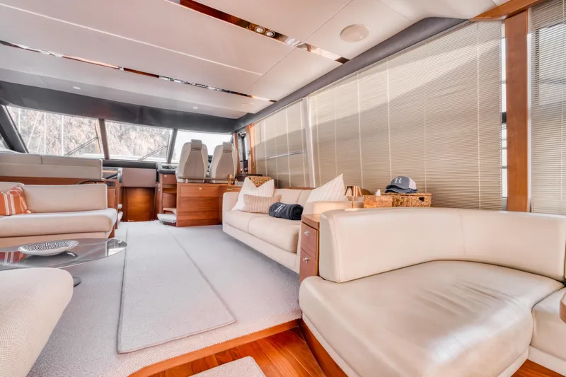  Yacht Photos Pics Luxurious interior of a 2016 Princess 68 yacht with elegant seating and modern design.