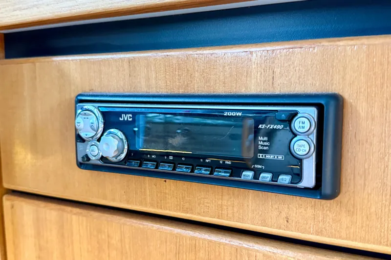 Pier Pressure Yacht Photos Pics JVC stereo system in 1999 Bayliner 3788 Command Bridge Motoryacht interior.