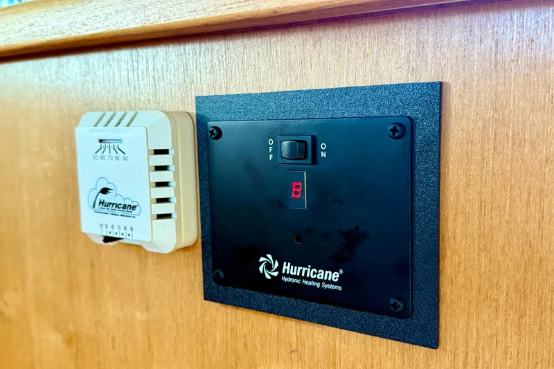 Pier Pressure Yacht Photos Pics Hurricane heating system controls on 1999 Bayliner 3788 Command Bridge Motoryacht interior panel.