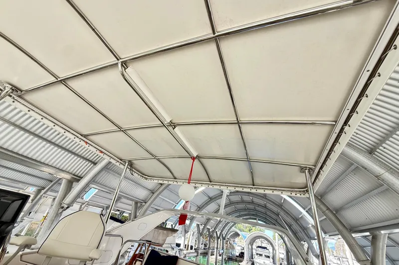 Pier Pressure Yacht Photos Pics 1999 Bayliner 3788 Command Bridge Motoryacht interior with canopy and seating.