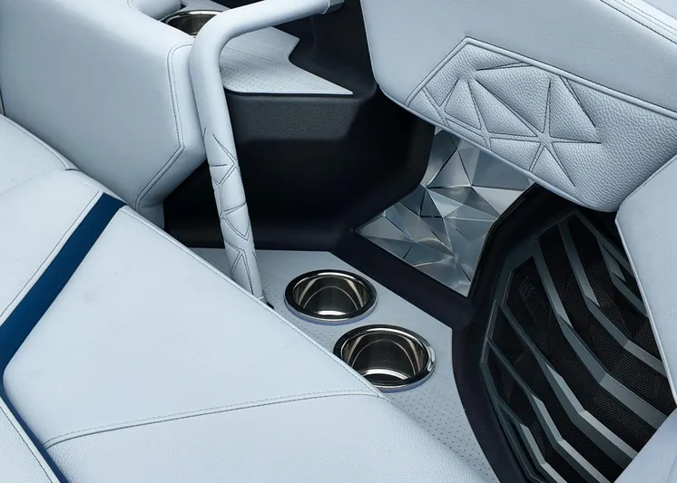  Yacht Photos Pics 2025 Nautique G23 Paragon interior with luxurious seating and cup holders.