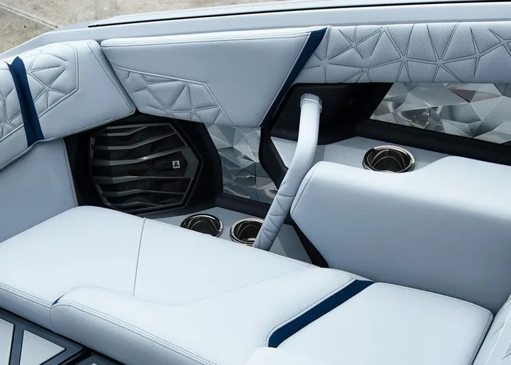  Yacht Photos Pics 2025 Nautique G23 Paragon interior with luxurious seating and modern speaker design.