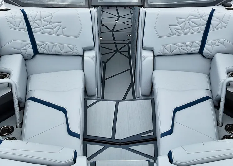  Yacht Photos Pics 2025 Nautique G23 Paragon interior with modern, geometric upholstery and sleek design.