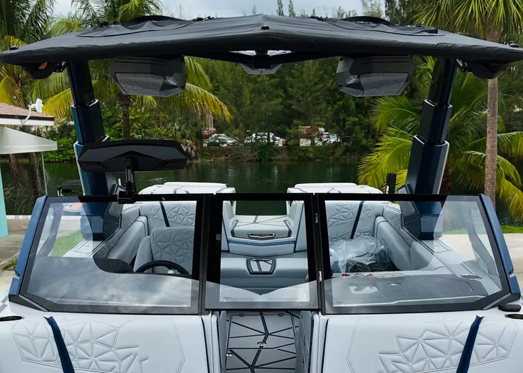  Yacht Photos Pics 2025 Nautique G23 Paragon boat interior with luxury seating and advanced features.