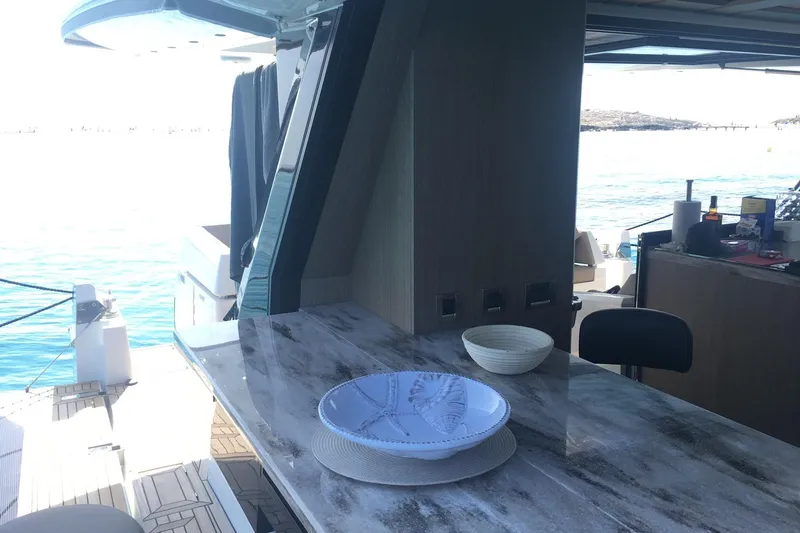  Yacht Photos Pics Luxurious 2018 Galeon 640 Fly yacht interior with elegant marble countertop and ocean view.