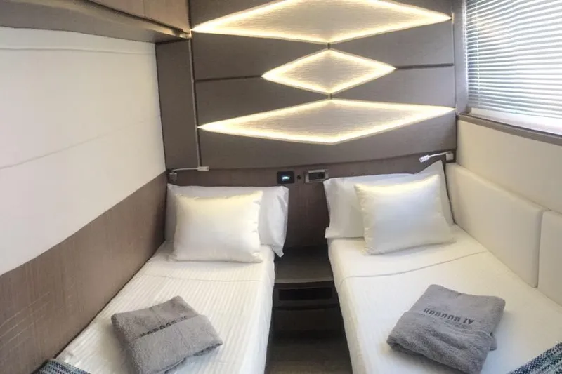  Yacht Photos Pics Luxurious twin cabin interior of 2018 Galeon 640 Fly yacht with modern lighting.