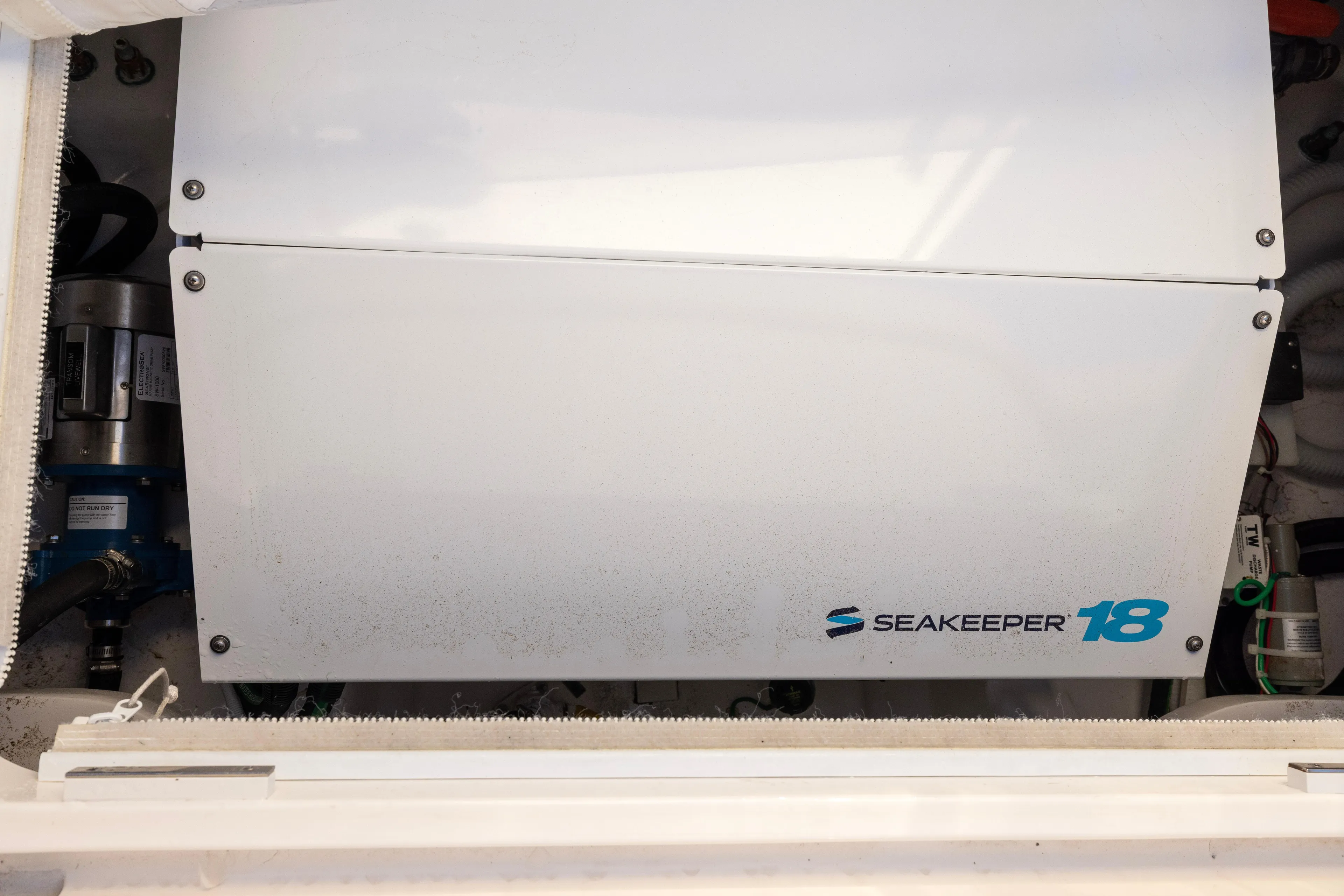 What A Country Yacht Photos Pics Seakeeper 18 stabilizer in 2022 Viking 54 Sport Coupe yacht engine room.