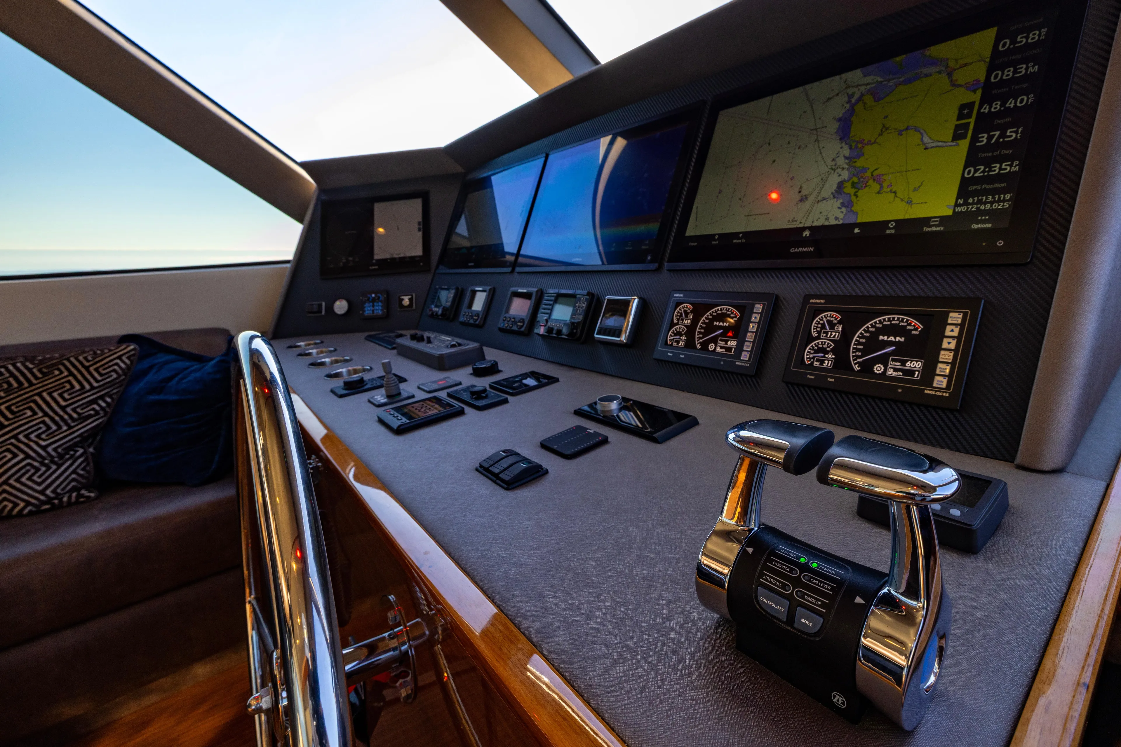 What A Country Yacht Photos Pics 2022 Viking 54 Sport Coupe helm with advanced navigation and control systems.