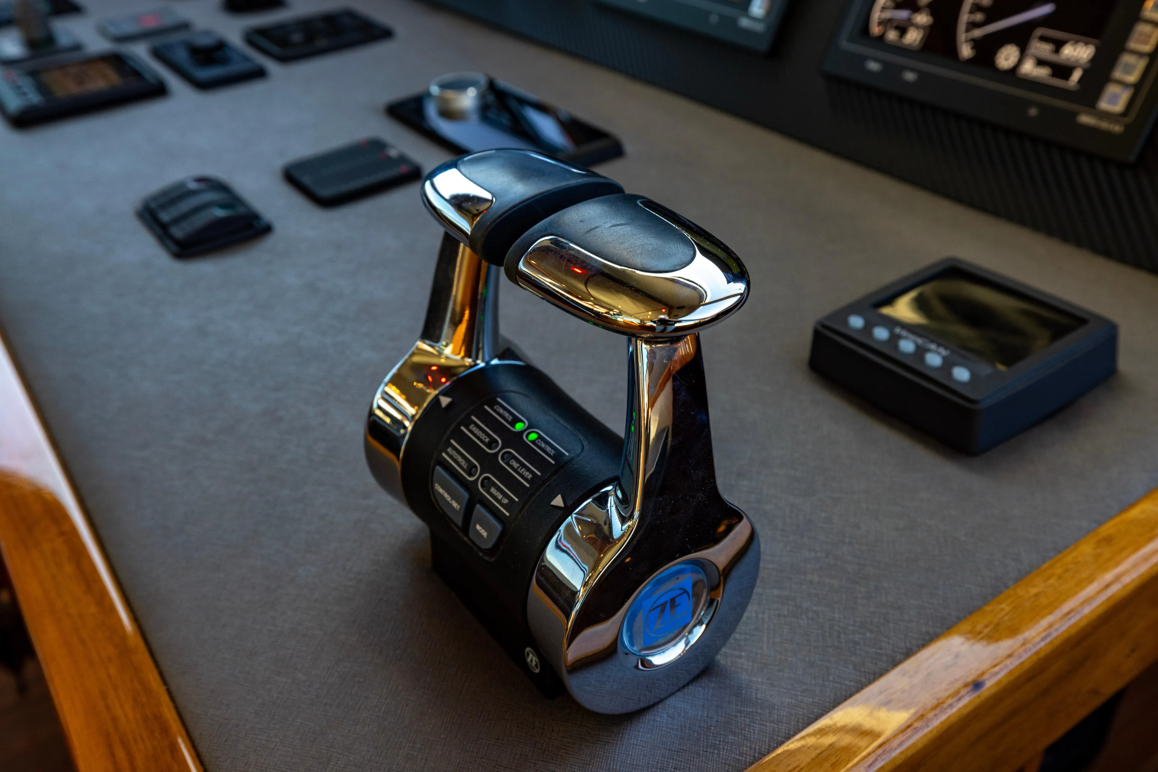 What A Country Yacht Photos Pics Control panel of 2022 Viking 54 Sport Coupe yacht with modern throttle levers.