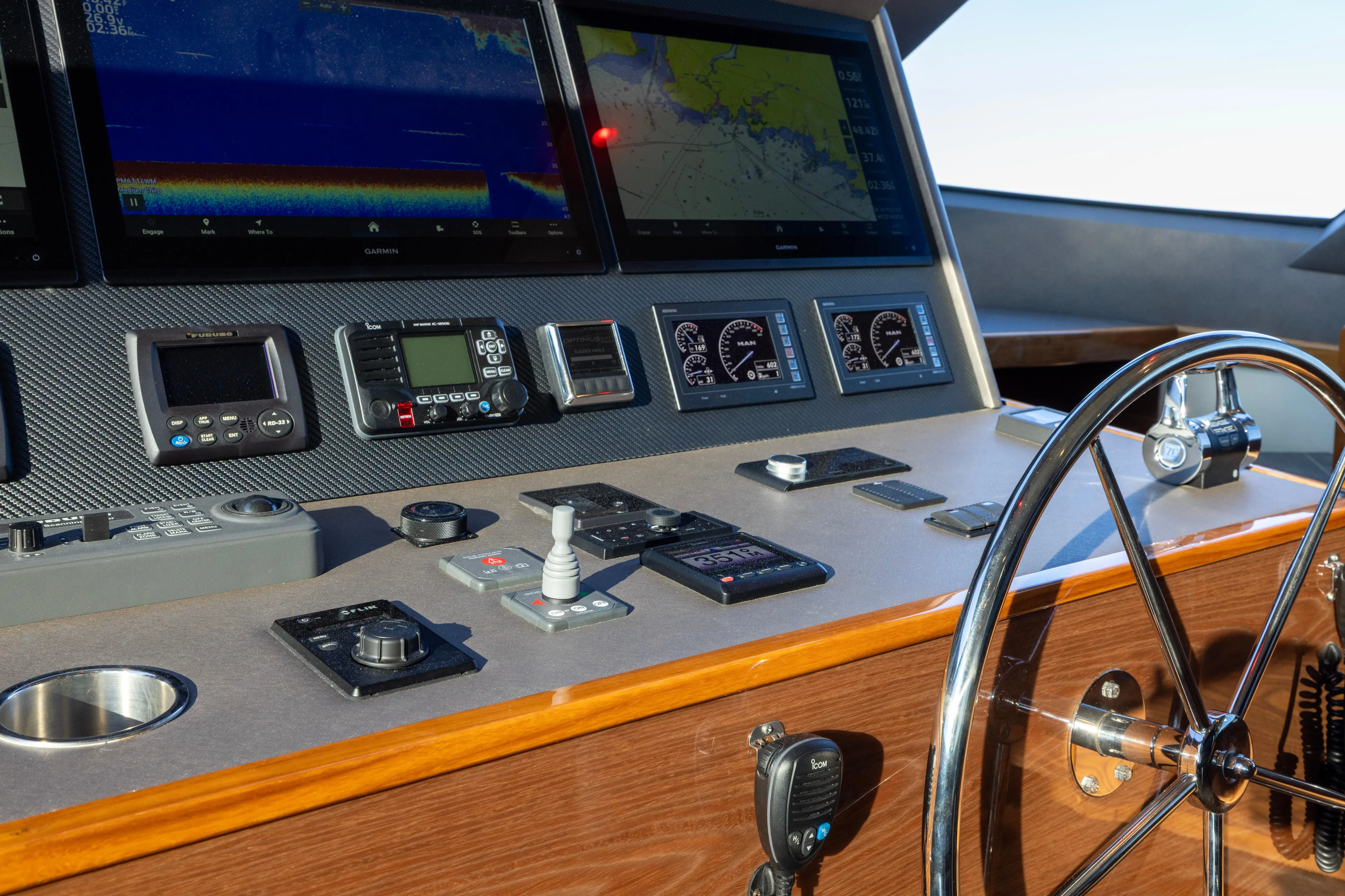 What A Country Yacht Photos Pics Control panel of 2022 Viking 54 Sport Coupe with navigation and communication systems.