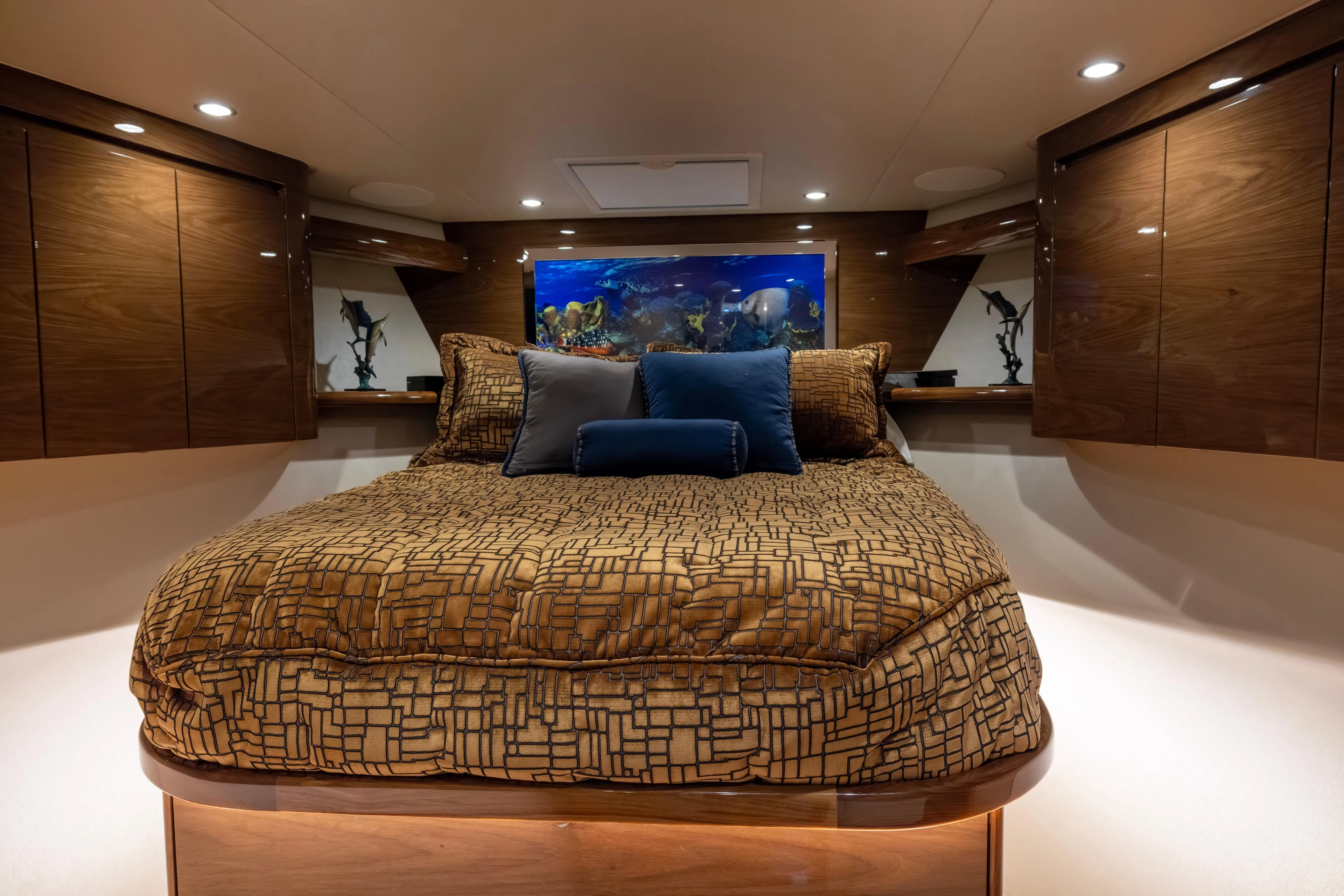 What A Country Yacht Photos Pics Luxurious bedroom interior of 2022 Viking 54 Sport Coupe yacht with elegant bedding and ambient lighting.