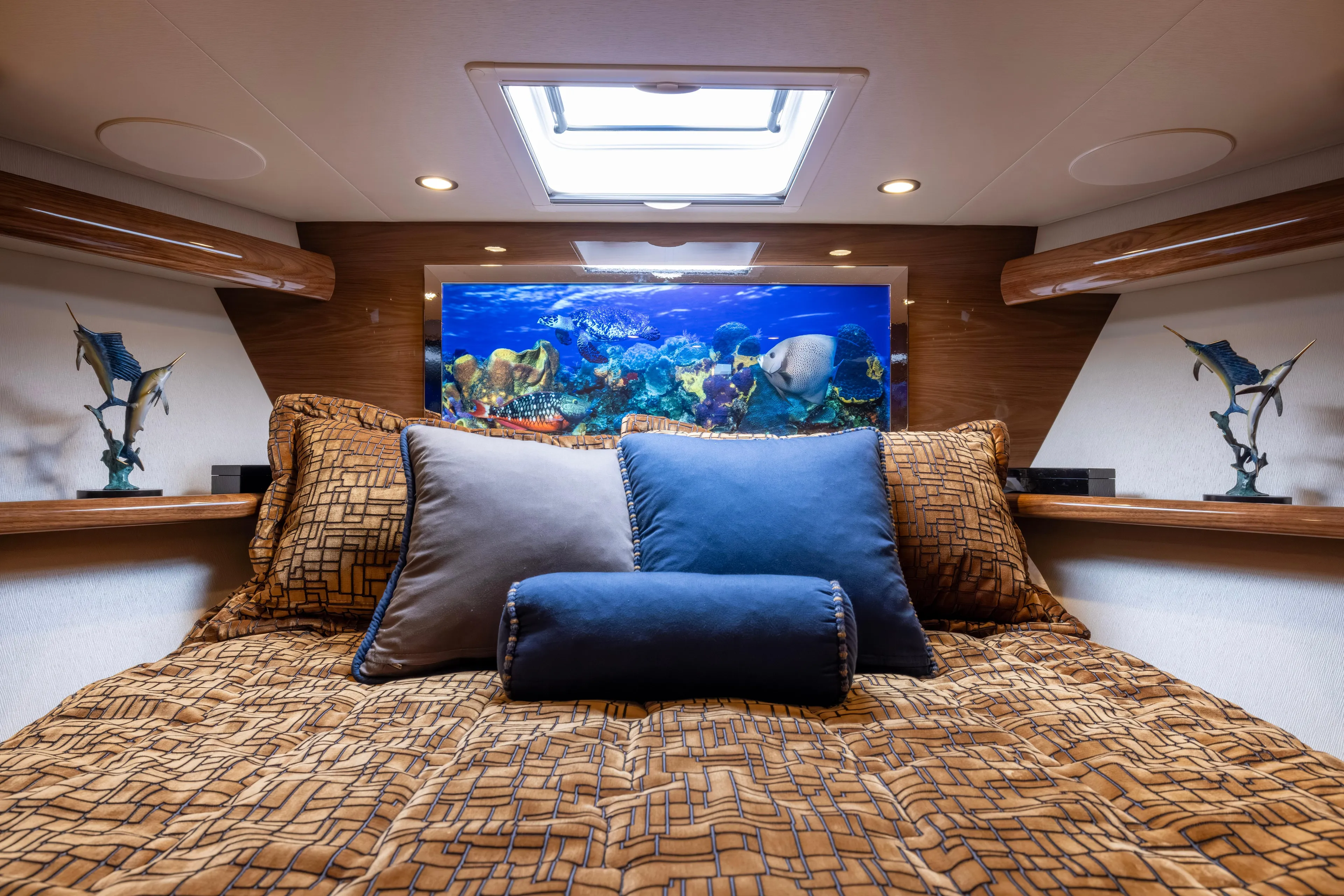 What A Country Yacht Photos Pics Luxurious interior of 2022 Viking 54 Sport Coupe with elegant bedding and marine decor.