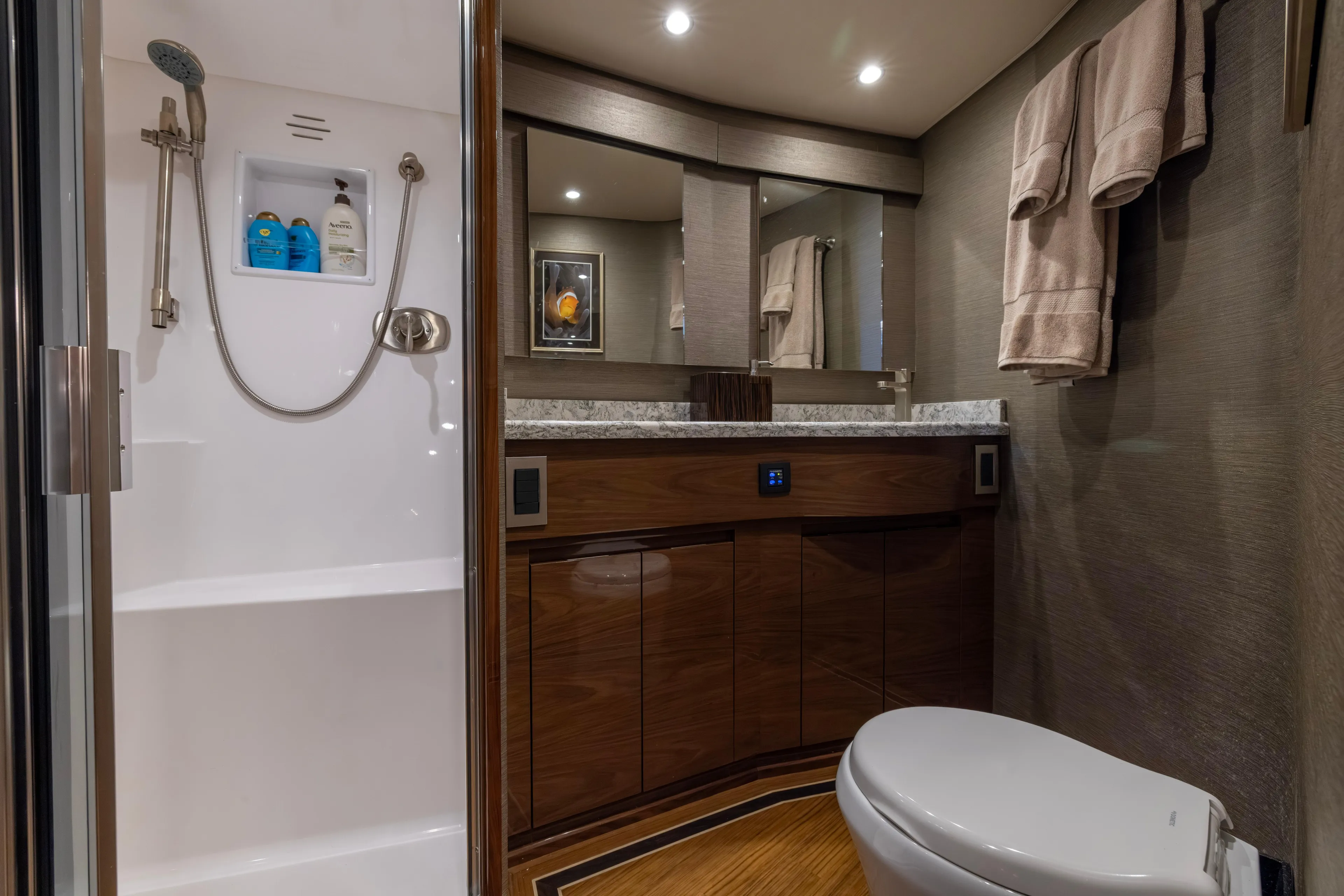 What A Country Yacht Photos Pics Luxurious bathroom in 2022 Viking 54 Sport Coupe yacht with modern fixtures and elegant design.