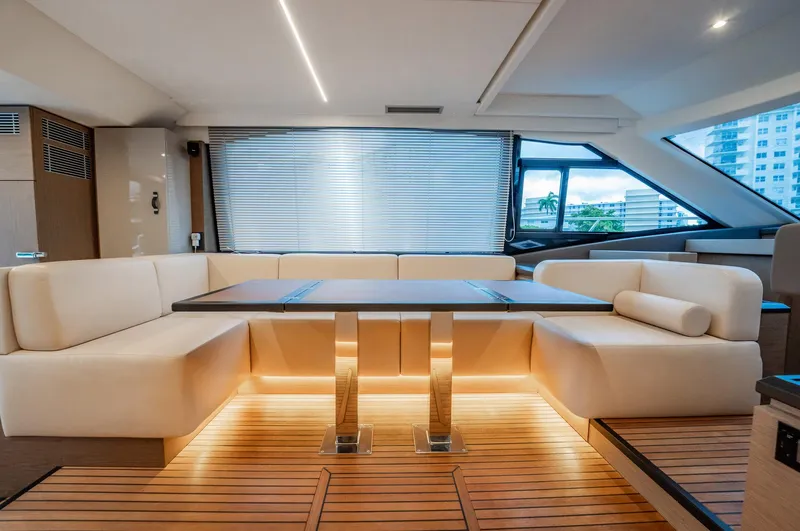 Kedem Plus Yacht Photos Pics Luxurious interior of 2021 Beneteau Monte Carlo 52 yacht with elegant seating and modern design.