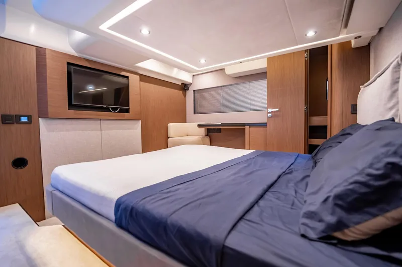 Kedem Plus Yacht Photos Pics Luxurious bedroom interior of 2021 Beneteau Monte Carlo 52 yacht with modern amenities.