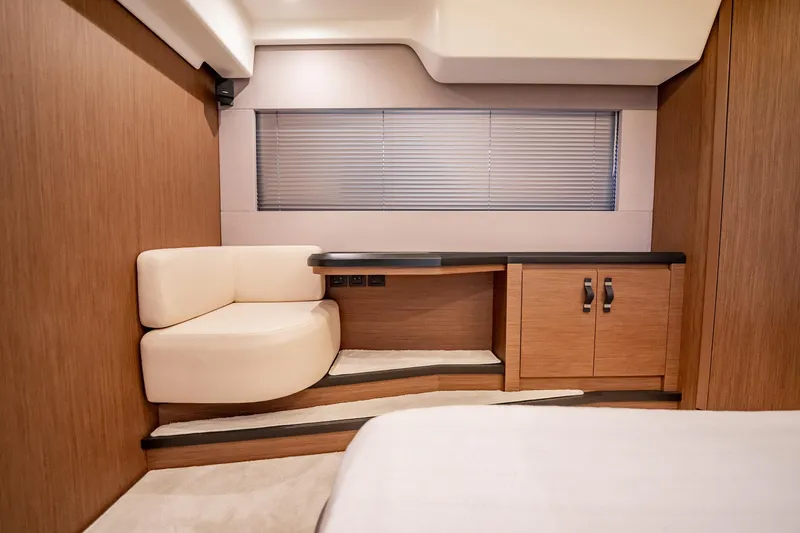 Kedem Plus Yacht Photos Pics Luxurious interior of 2021 Beneteau Monte Carlo 52 yacht with wood and leather finishes.