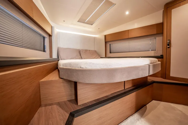 Kedem Plus Yacht Photos Pics Luxurious bedroom interior of 2021 Beneteau Monte Carlo 52 yacht with modern design.