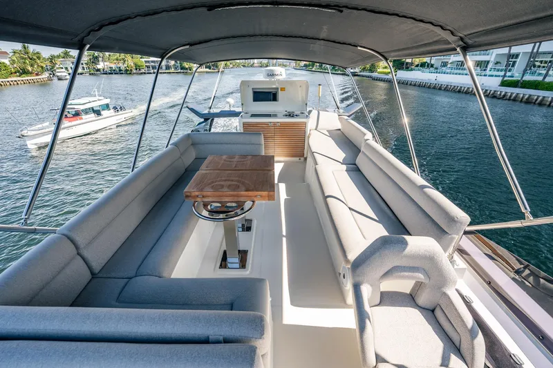 Kedem Plus Yacht Photos Pics Luxurious 2021 Beneteau Monte Carlo 52 yacht interior with spacious seating and elegant design.