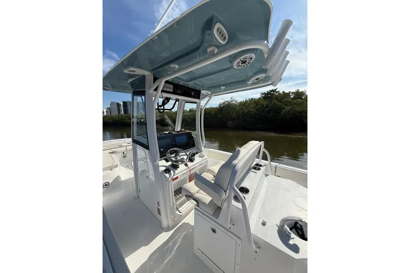  Yacht Photos Pics 2025 Sea Hunt Escape 28 boat interior with modern helm and seating.