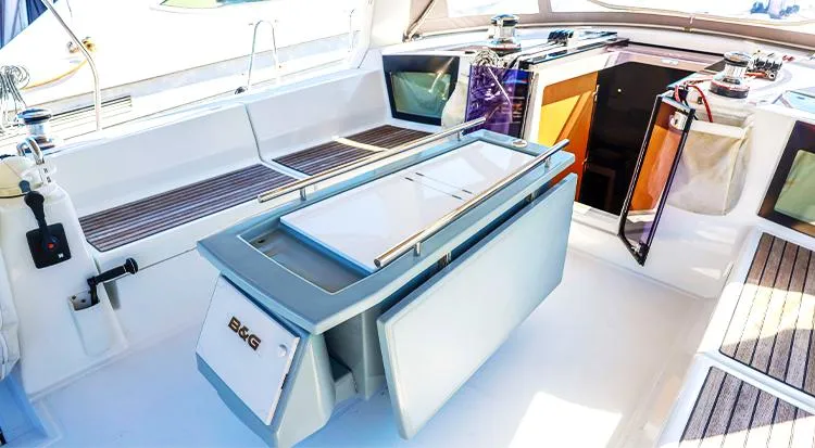 New Horizon Yacht Photos Pics 2018 Beneteau Oceanis 45 yacht cockpit with modern navigation equipment and seating area.